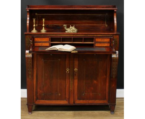 A Regency rosewood and brass marquetry secretaire chiffonier, shaped superstructure with shallow shelf above a long fall fron