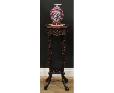 A Chinese hardwood jardiniere stand, lobed square top with beaded border and inset marble panel above a shaped and pierced fr