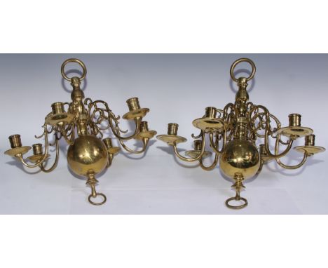 A near pair of Dutch brass six-light chandeliers, 45cm high, 46cm wide 