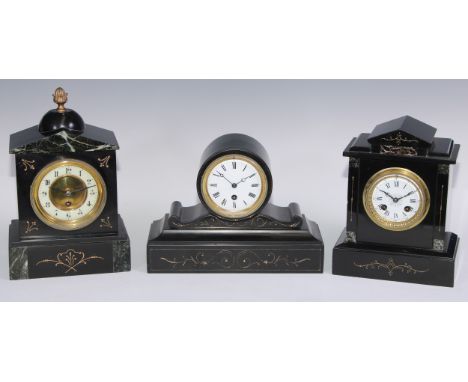 A 19th century French black slate drum head mantel timepiece, 9cm circular clock dial inscribed with Roman numerals, eight da