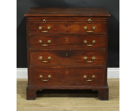 A George III mahogany bachelor’s chest, rectangular top with moulded edge above a slide and four long graduated cockbeaded dr