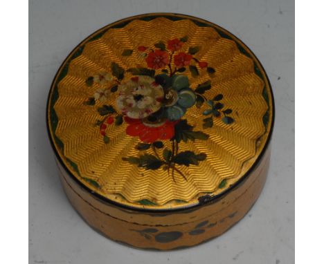 A 19th century papier mache and vernis martin circular table snuff box, push-fitting cover painted with a spray of summer flo