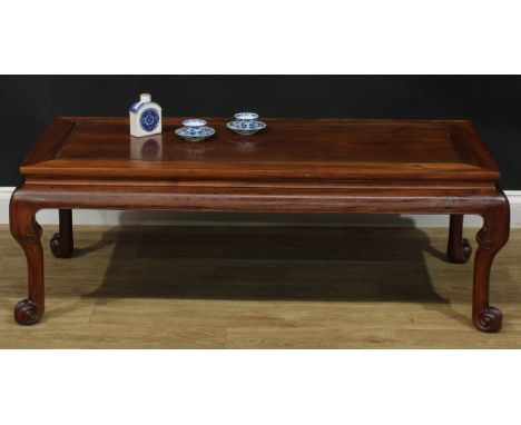 A Chinese hongmu waisted low tea or kang table, rectangular top, cabriole legs, scroll feet, 43cm high, 127cm long, 61cm wide