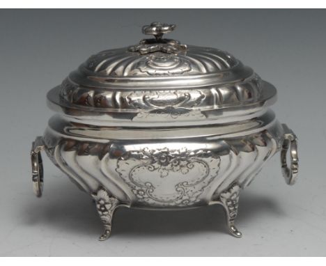 A Scandinavian silver fluted oval bombe shaped tea caddy, hinged domed cover with flower finial, chased in the Rococo taste, 