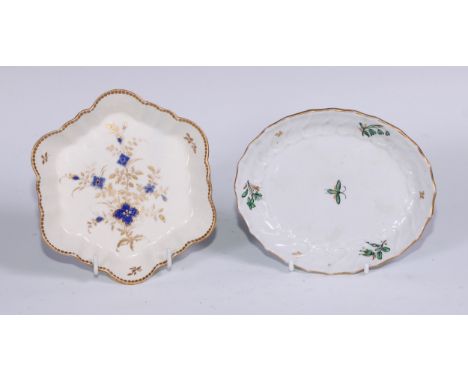 A Barr Flight &amp; Barr Worcester shaped oval teapot stand, painted in tones of green and gilt with an insect and sprigs, mo