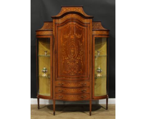 A Sheraton Revival satinwood banded mahogany and marquetry display cabinet, caddy top above a serpentine door and three drawe