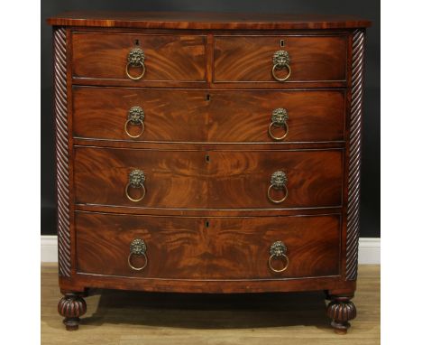 A George IV mahogany bowfront chest, slightly oversailing top above two short and three long graduated cockbeaded drawers, li