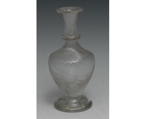 An early 19th century wrythen glass ovoid decanter, pontil scar to base, 17.5cm  high 