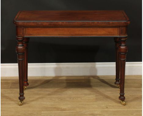 A 19th century parcel-ebonised mahogany card table, hinged top enclosing a baize lined playing surface and counter wells, tur