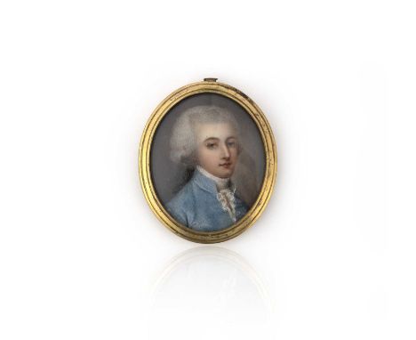 λ An ivory portrait miniature, late 18th century, of oval outline, set with an ivory miniature depicting a young man, to a gi