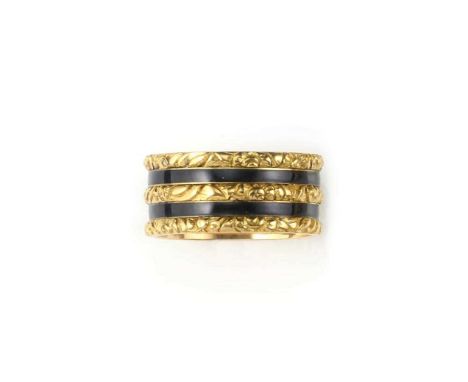 A George IV gold and enamel mourning ring, circa 1821, applied with two bands of black enamel, spaced by bands of engraved fl