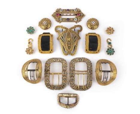 A collection of gilt metal and paste buckles, 18th/19th century, comprising: a pair of gilt metal and cut steel buckles; a bu
