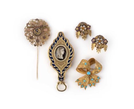 A magnifying glass, a stick pin and a pair of earrings, mid 19th century, comprising: a folding magnifying glass, the handle 