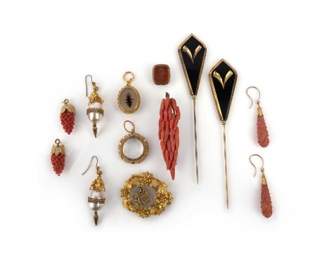 λ A group of jewels, 19th century, comprising: two pairs of carved coral drop earrings, one designed as grape vines, hook fit