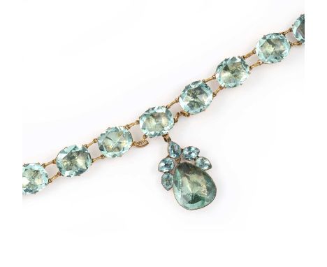 A rare 'Queen Anne' paste necklace, mid 18th century, composed of oval rose-cut pale blue 'aquamarine' pastes, claw-set in fo