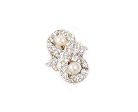 Garrard, a pearl and diamond brooch, circa 1900, designed as a ribbon wrapped in a figure of eight, set with cushion-shaped d