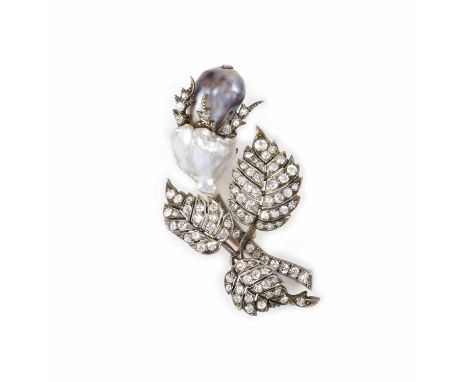 A pearl and diamond brooch, late 19th century, designed as a rose bud, the bud composed of two baroque pearls, the leaves pav