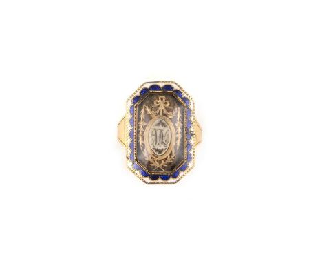 λ An ivory, enamel and hairwork mourning ring, late 18th century, of cut-cornered rectangular outline, set with a glazed pane