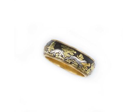 Alexis Falize, an extremely rare varicoloured gold ring, circa 1870, the central band with a scene of dogs hunting a large bo