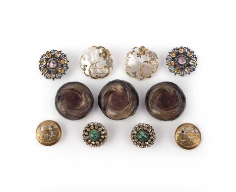 A collection of buttons, 19th/20th century, comprising: a group of Art Nouveau moulded glass buttons; a pair of openwork butt