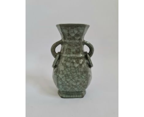 A Chinese green crackle glaze celadon ring handle vase height 21 cm.