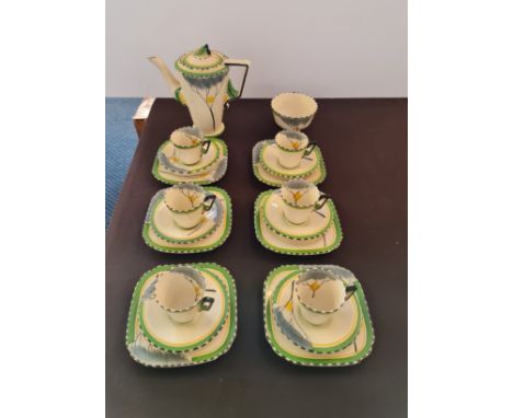 A art deco twenty piece Burleigh Ware coffee set grey tree and green border design.