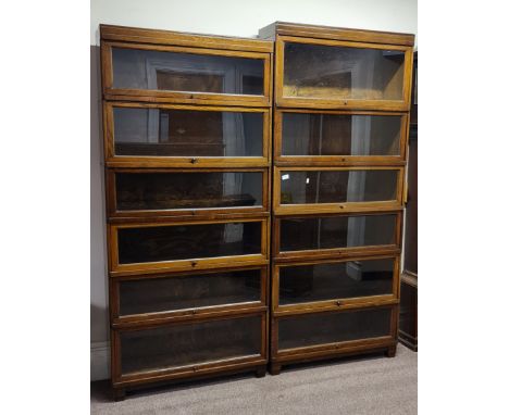Two oak Globe Wernicke six section bookcases.