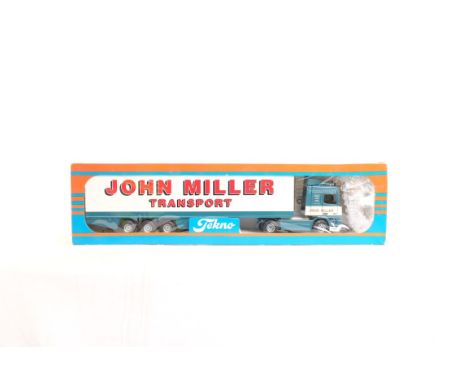  Tekno DAF XF 95 Box Trailer - John Miller | Scale: 1:50 | Model Code:  | Certificate: No | Lot Condition: Good | Mirrors: No