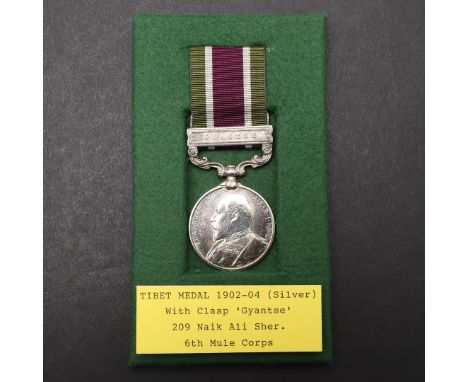 A TIBET MEDAL 1903-04, SILVER ISSUE WITH GYANTSE CLASP TO THE 6TH MULE CORPS. A Tibet medal, silver issue with Gyantse clasp,