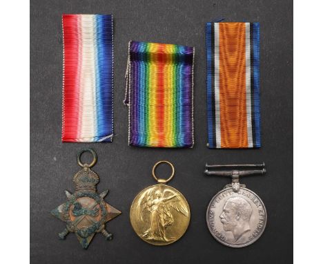 A FIRST WORLD WAR TRIO TO A CASUALTY WITH THE 5TH BATTALION OF THE DORSET REGIMENT. A Great War Trio comprising 1914-15 Star 