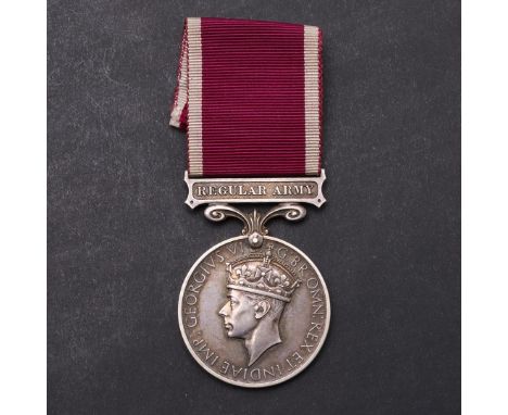 A GEORGE VI REGULAR ARMY LONG SERVICE AND GOOD CONDUCT MEDAL TO THE EAST YORKSHIRE REGIMENT. A Long Service and Good Conduct 