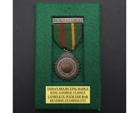 A GEORGE VI MEDAL 'FOR RECRUITING'. A George VI medal with portrait to the centre within 'For Recruiting', numbered 3757 to t
