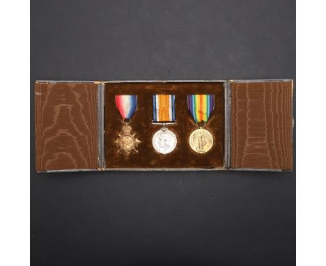 A FIRST WORLD WAR GROUP OF THREE TO AN OFFICER WITH THE WELSH REGIMENT, TWICE WOUNDED AT MAMETZ WOOD. A group of three compri