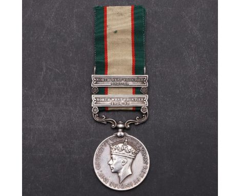 A GEORGE VI TWO CLASP INDIAN GENERAL SERVICE MEDAL 1936-39 TO THE SIKH REGIMENT. An Indian General Service Medal with North W