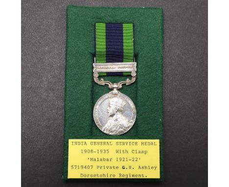AN INDIAN GENERAL SERVICE MEDAL 1908 - 1935 WITH MALABAR 1921-22 CLASP TO THE DORSET REGIMENT. A George V India General Servi