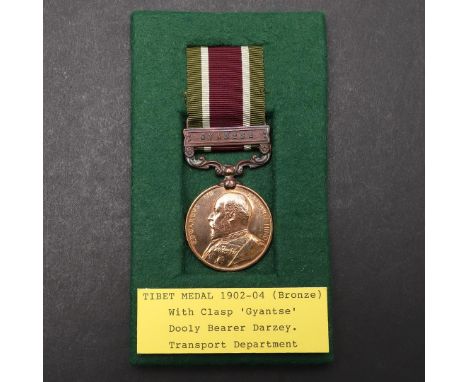 A TIBET MEDAL 1903-04, BRONZE ISSUE WITH GYANTSE CLASP TO THE TRANSPORT DEPARTMENT. A Tibet medal, bronze issue with Gyantse 