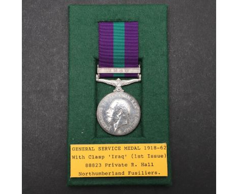 A GENERAL SERVICE MEDAL 1918-1962 WITH IRAQ CLASP TO THE NORTHUMBERLAND FUSILIERS. A George V General Service Medal with Iraq