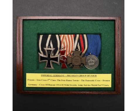 IMPERIAL GERMANY: A PRUSSIAN IRON CROSS GROUP OF FOUR. A group of four comprising Iron Cross, second class, Free Hanse Towns 