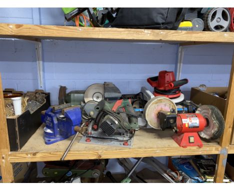 Shelf containing grinder, circular saw, vice etc