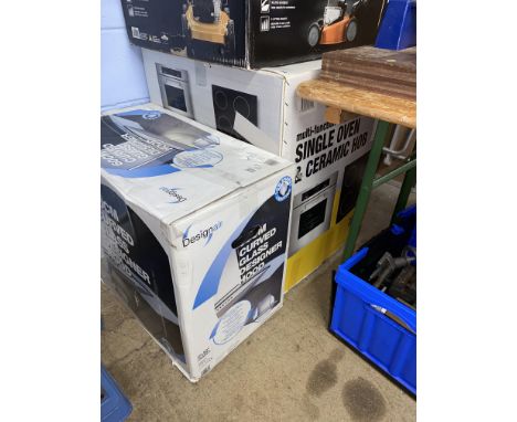 A boxed Designer 60cm curved glass designer hood and a boxed single oven and a ceramic hob