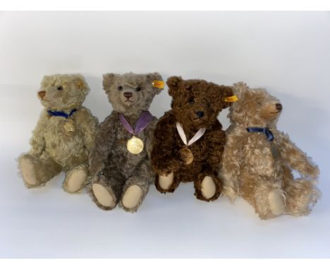 Four Steiff Collectors bears, to include versions by Danbury Mint for Steiff, including a 2006 year bear, the largest 34cm H