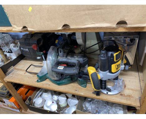 Shelf of power tools, Parkside saw, drywall sander etc