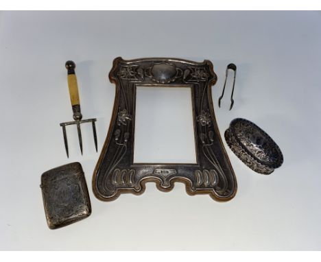 An attractive Art Nouveau silver photograph frame, hallmarked indistinctly and measuring 20cm x 25cm and other silverware inc