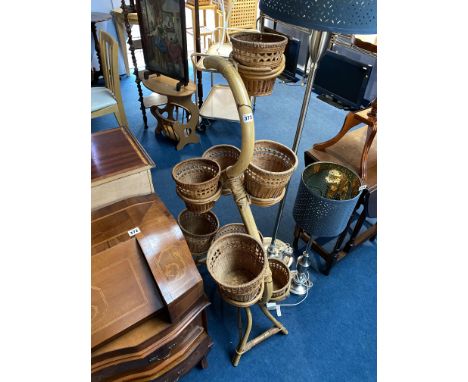 A bamboo eight pot plant stand