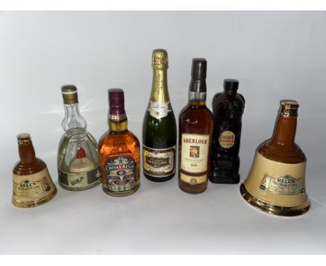 A 1970s Bols Ballerina bottle of liqueur, plus bottles of Aberlour Scotch Whisky, Chivas Regal, a Cossack Vodka bear bottle a