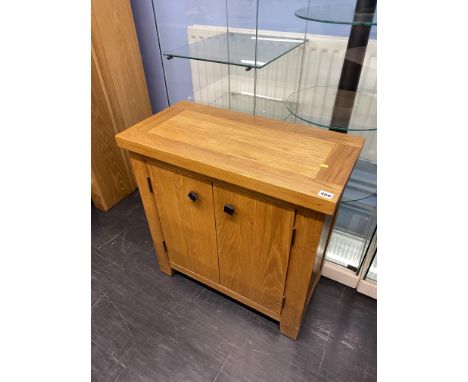 Light oak cabinet, with two doors, 70cm W