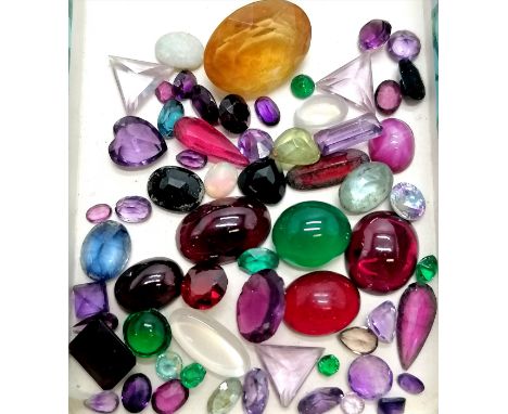 Qty of loose gemstones inc star ruby cabochon, amethyst, citrine etc 