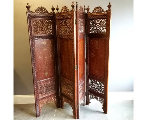 Vintage Indian teak 4 fold dressing screen or room divider, with brass inlay and carved fretwork decoration, 188cm wide x eac