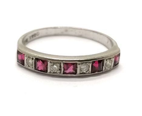 18ct marked white gold ruby / diamond half eternity ring - size V &amp; 4.4g total weight 