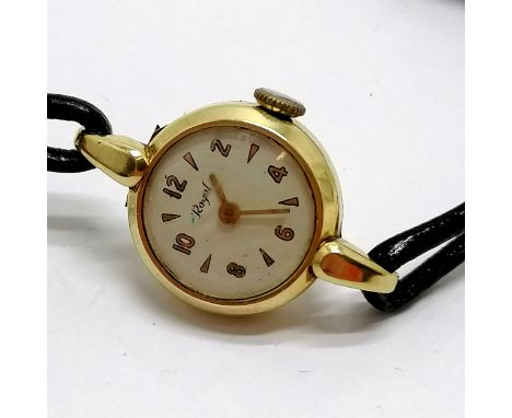 14ct gold cased manual wind ladies wristwatch (Royale) on a leather strap - total weight 9.8g 